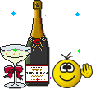 Еда Смайлик рядом с бутылкой шампанского смайлы