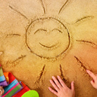 Солнце Солнце нарисованное на песке смайлы